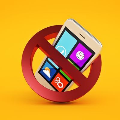 Illustrasjon av smarttelefon bak et forbudsskilt